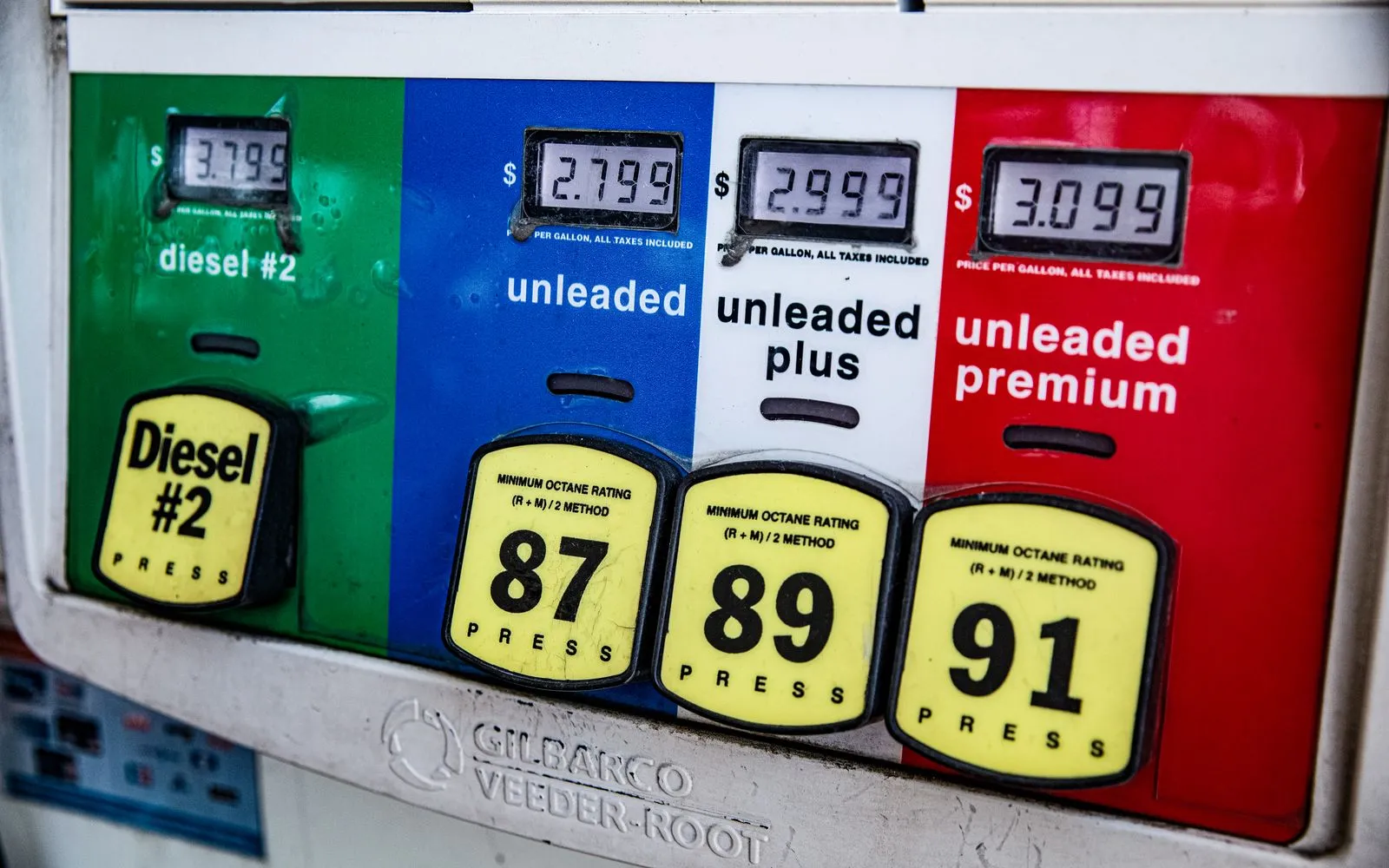 Vintage Los Angeles gas station with fuel pump prices and octane ratings on display