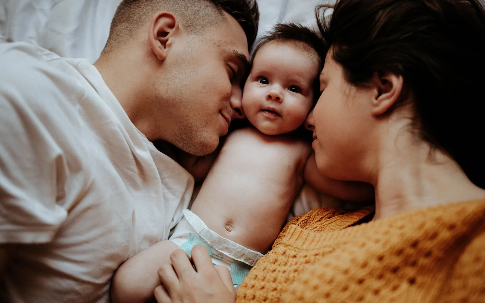 Young family together at home