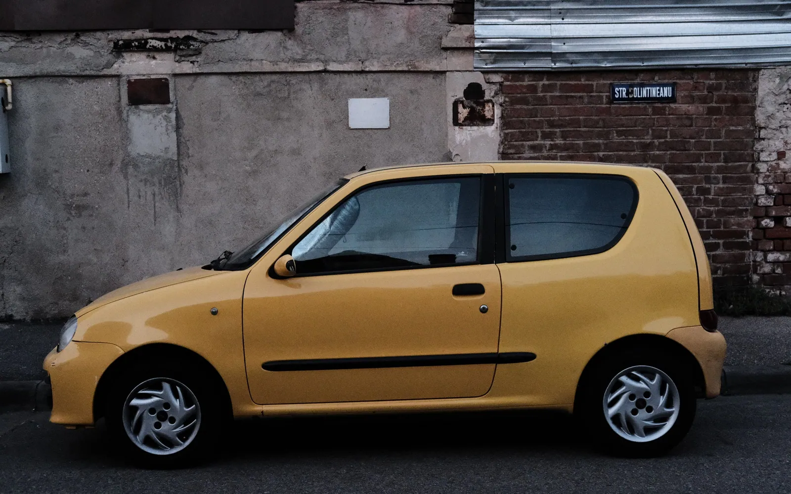 Small compact car on a street