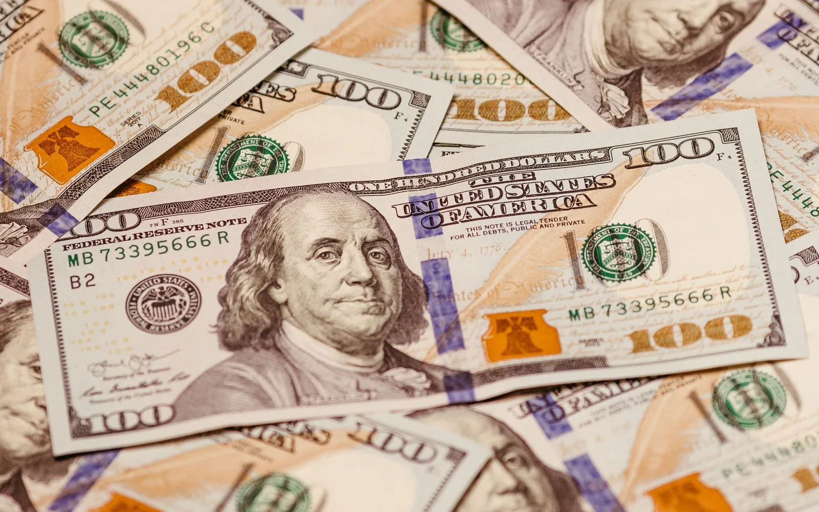 Close-up of US hundred dollar bills