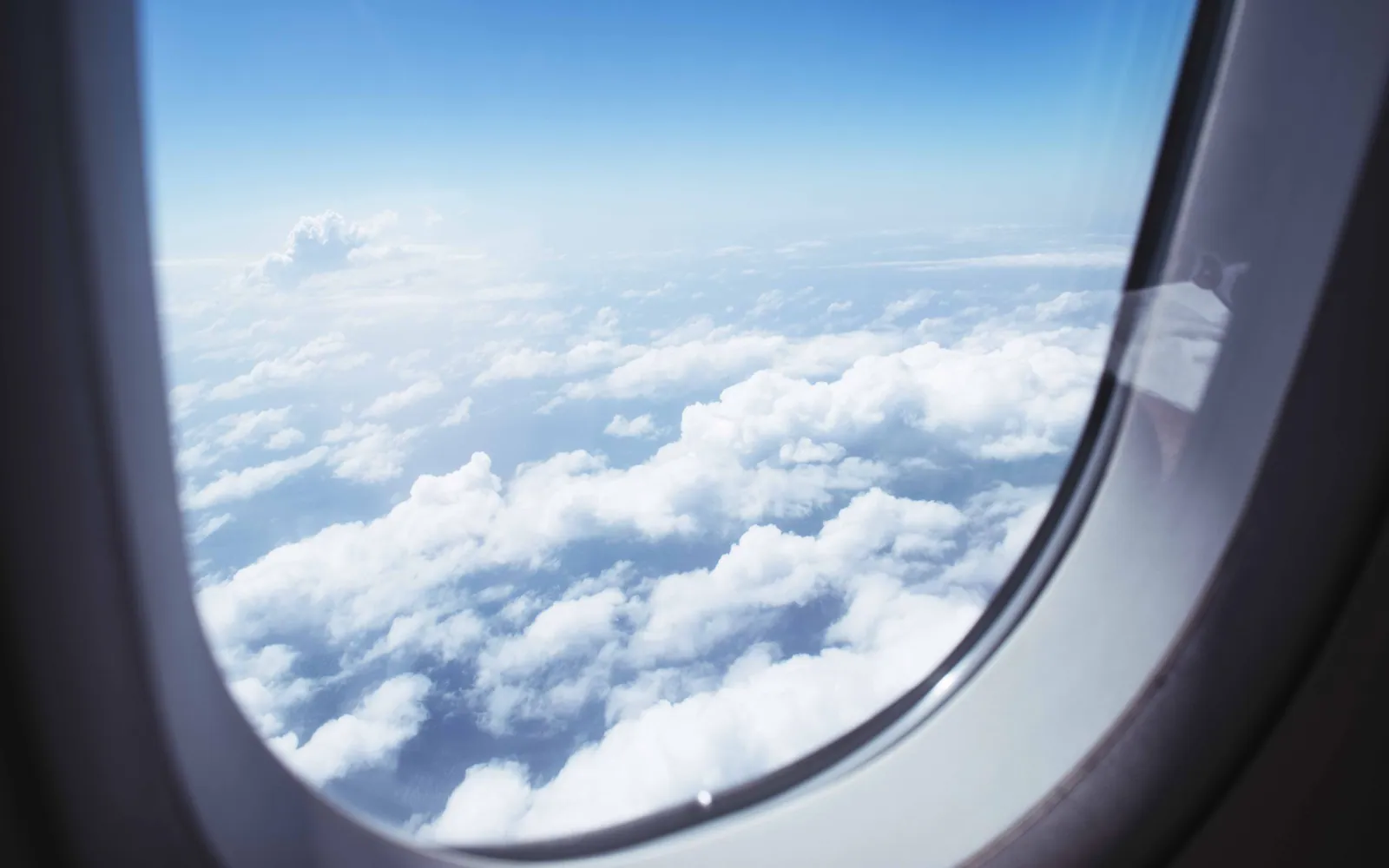 View of clouds from an airplane window