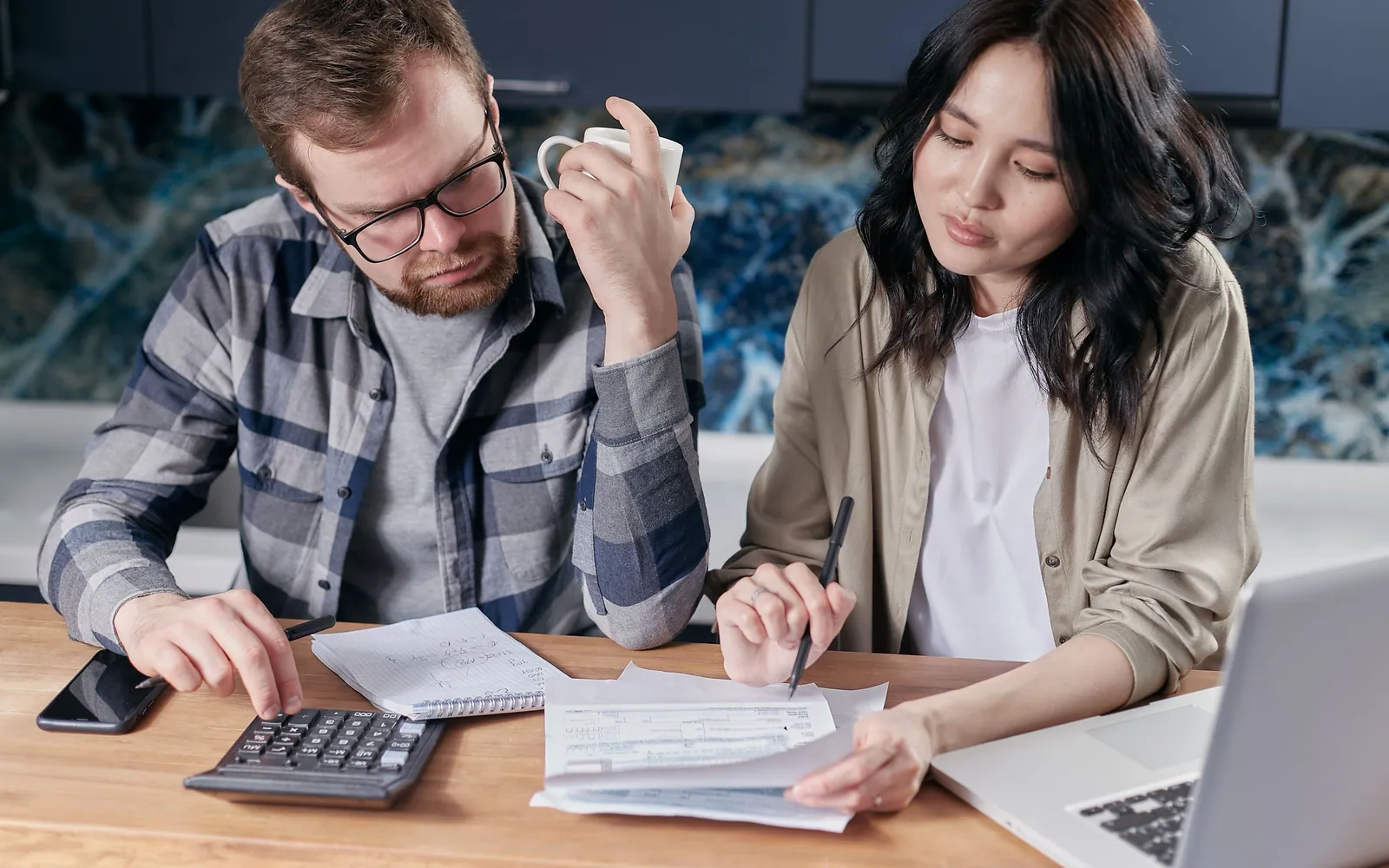 Person reviewing finances at home