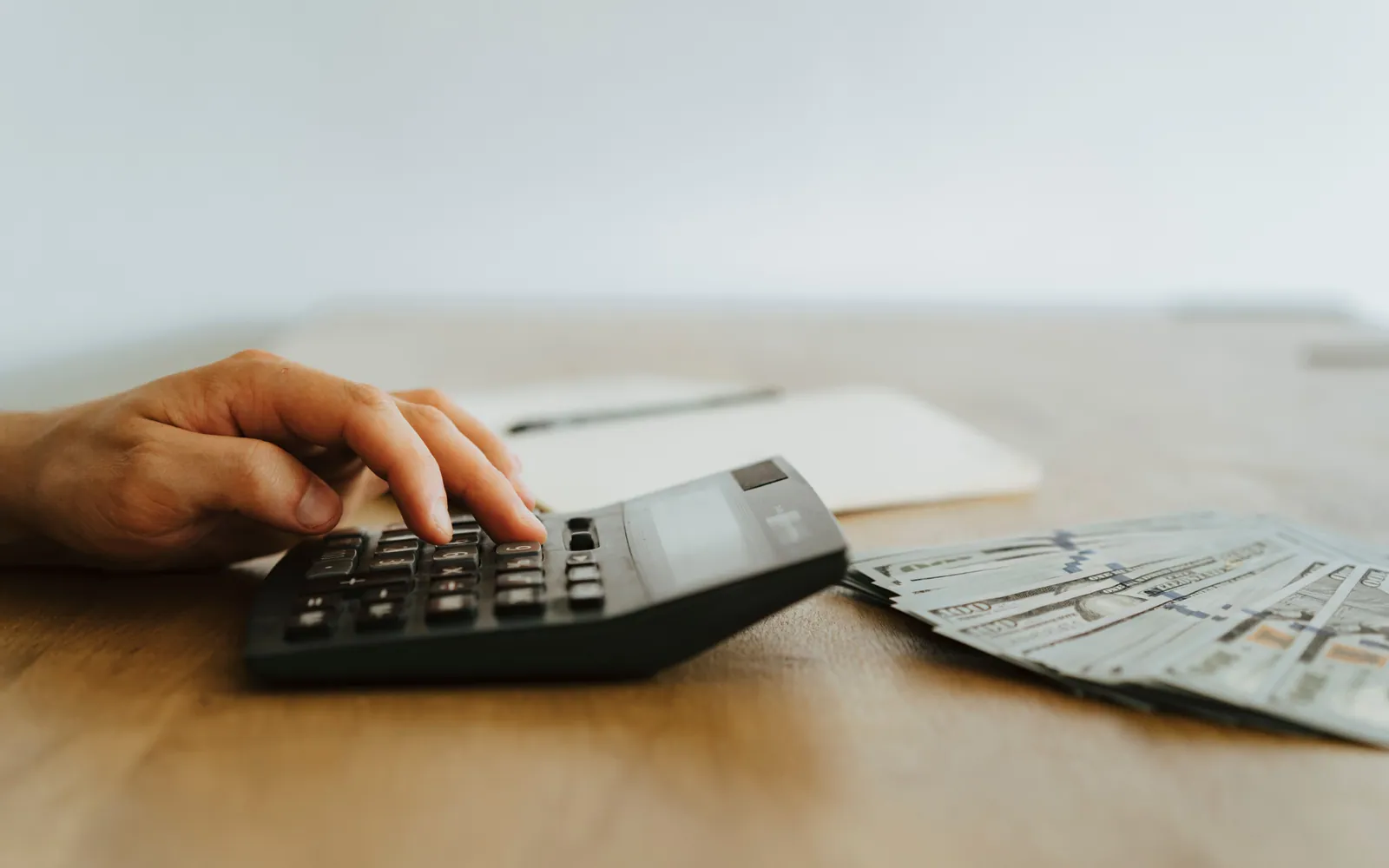 Calculator and bills on a table