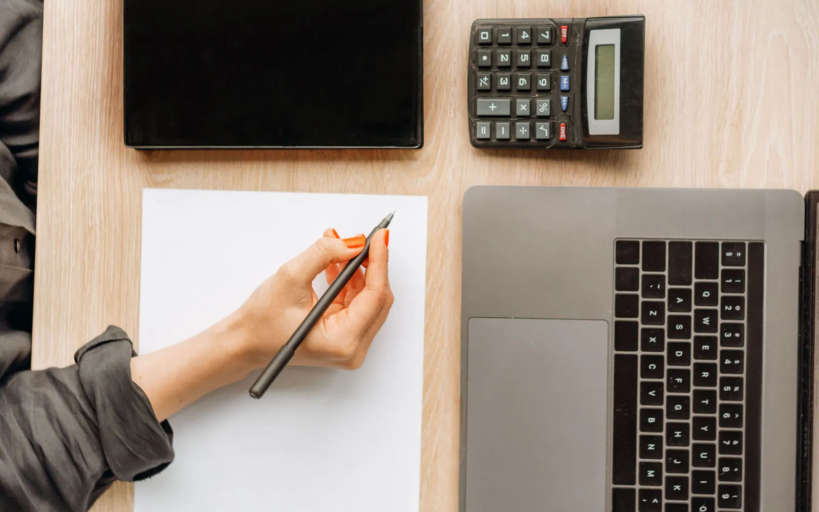 Person doing calculations at a desk