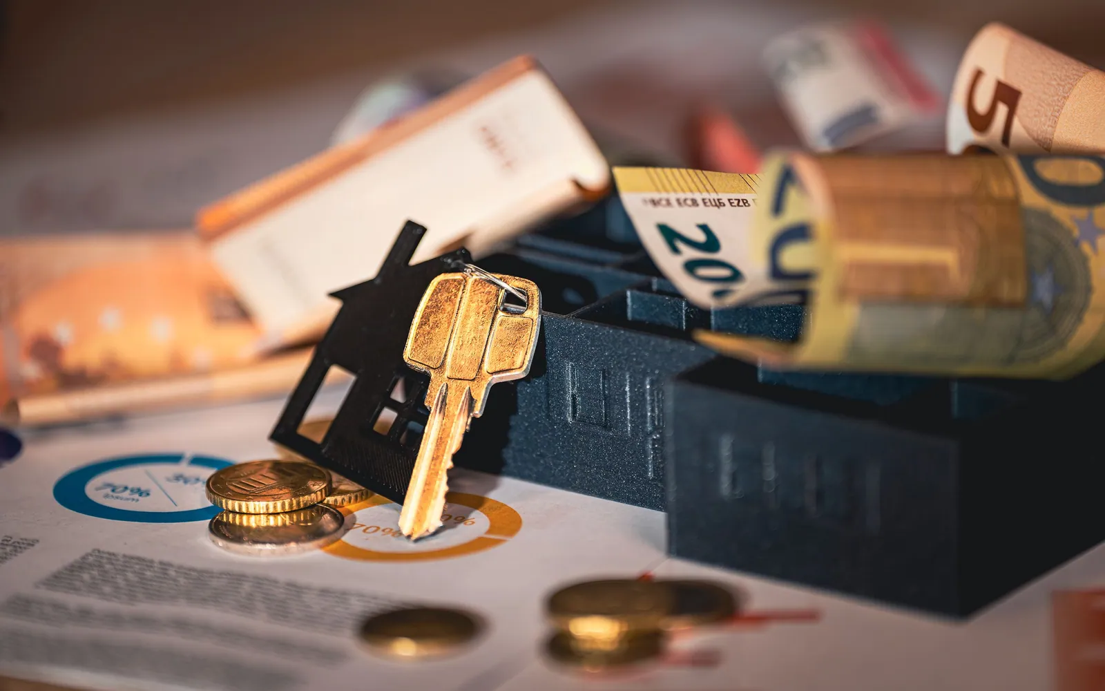 House keys and mortgage documents on a desk