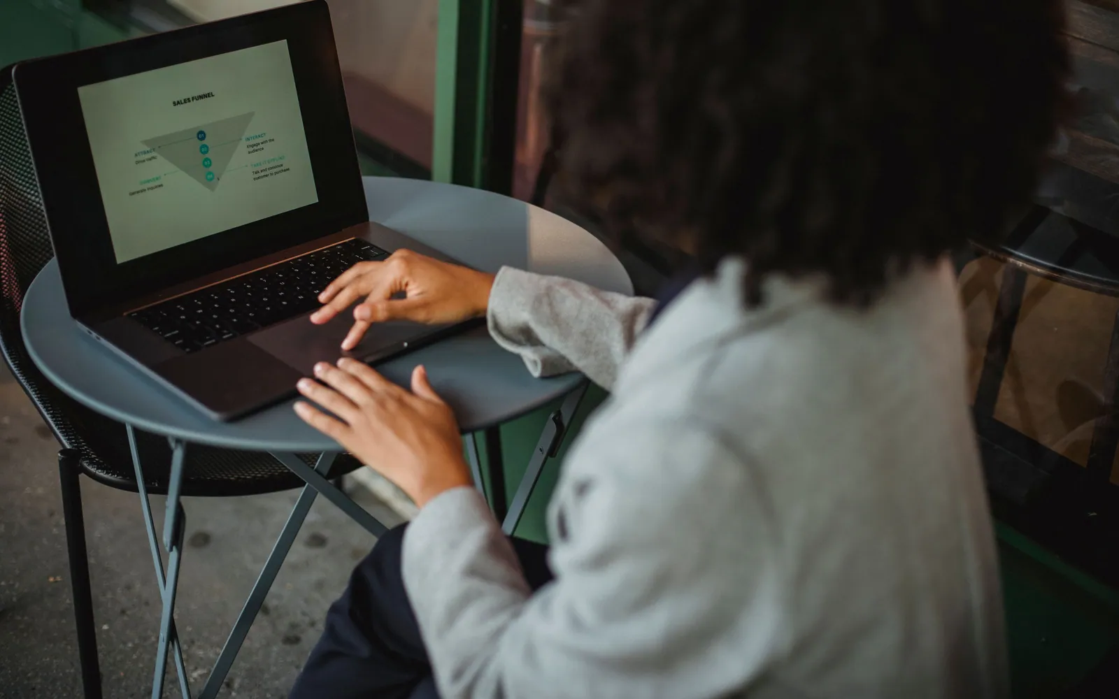Person comparing insurance options on a laptop