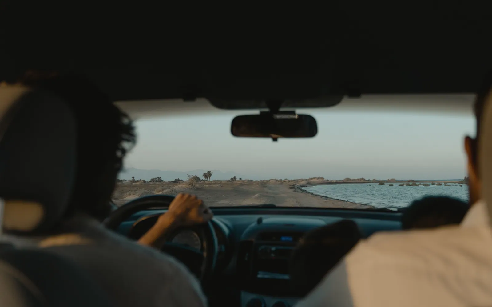 Person driving a car on the road