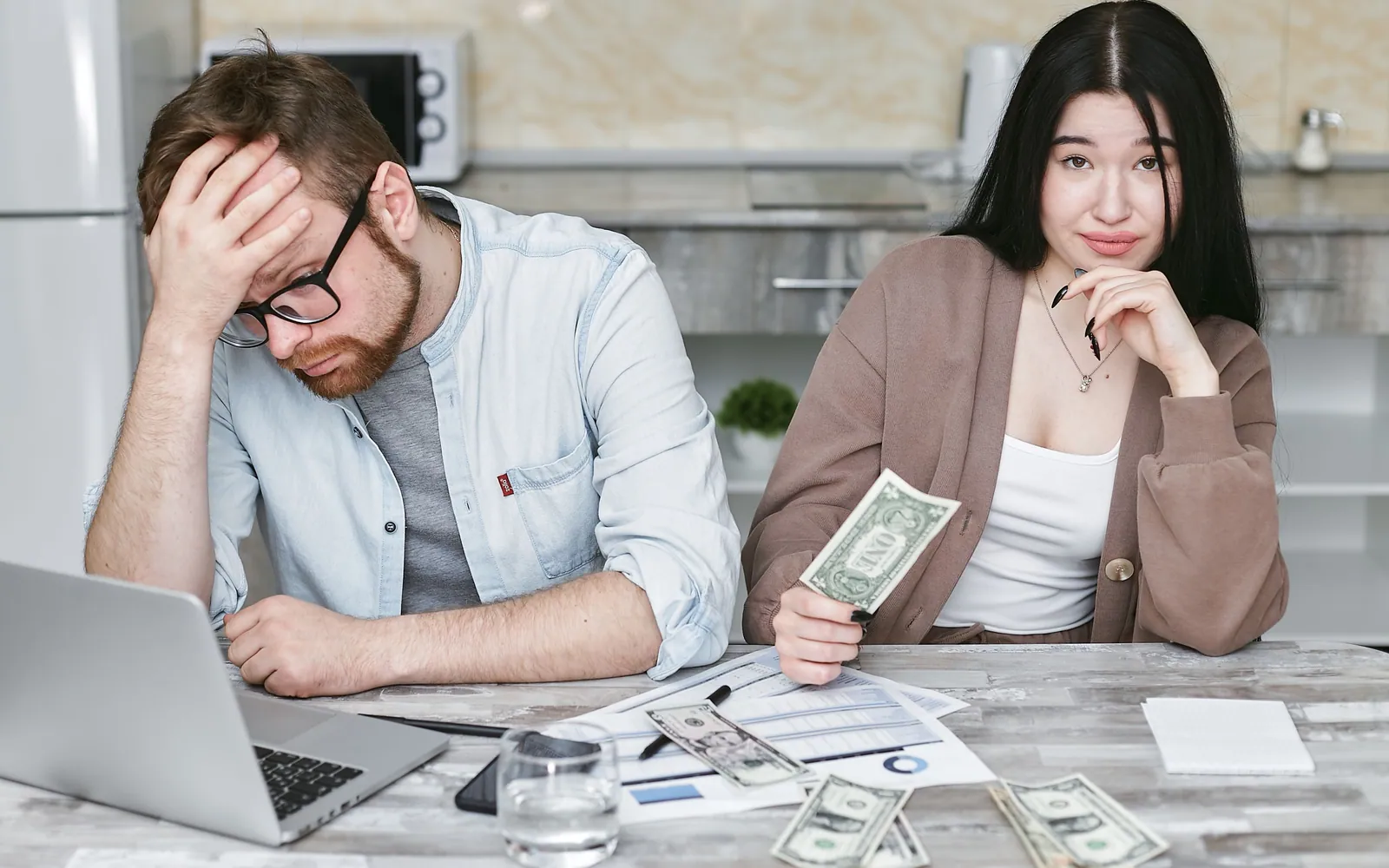 Couple planning savings at home