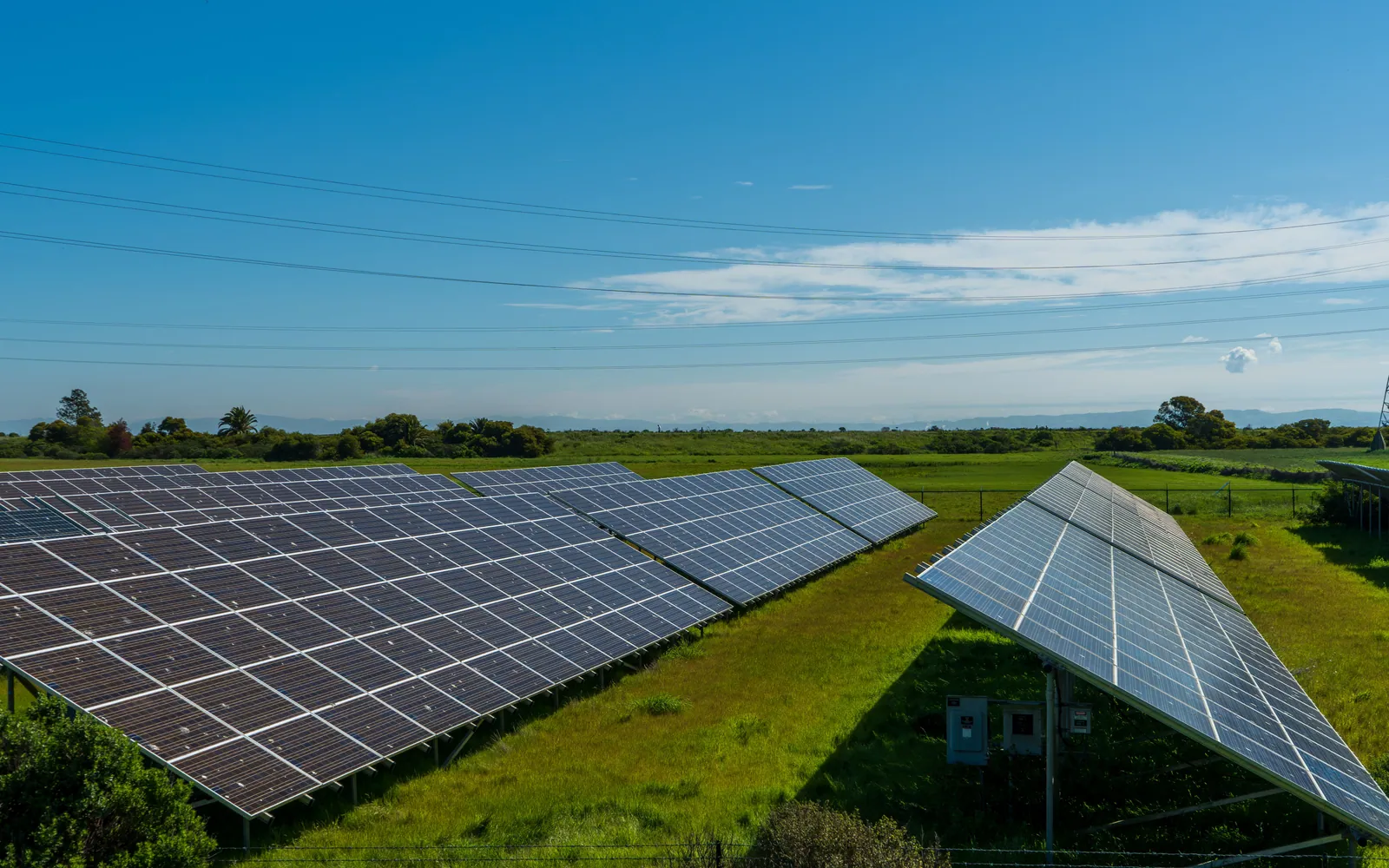 Solar panels in a sunny field