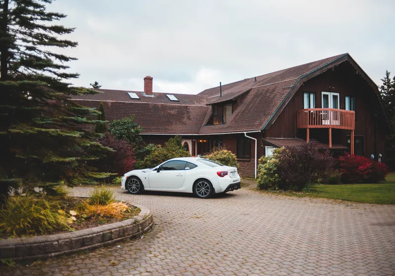 Two cars parked in driveway
