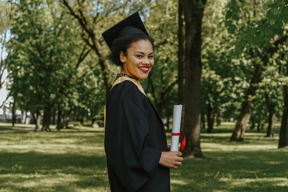 Graduate in cap and gown