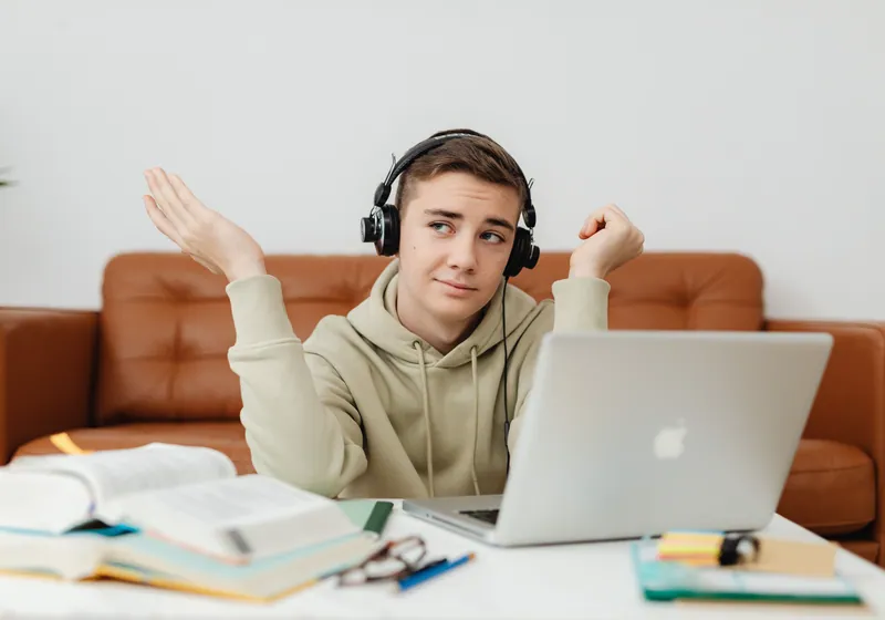 Person taking online course on laptop