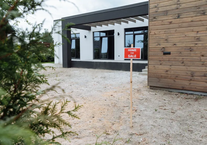 House with for sale sign