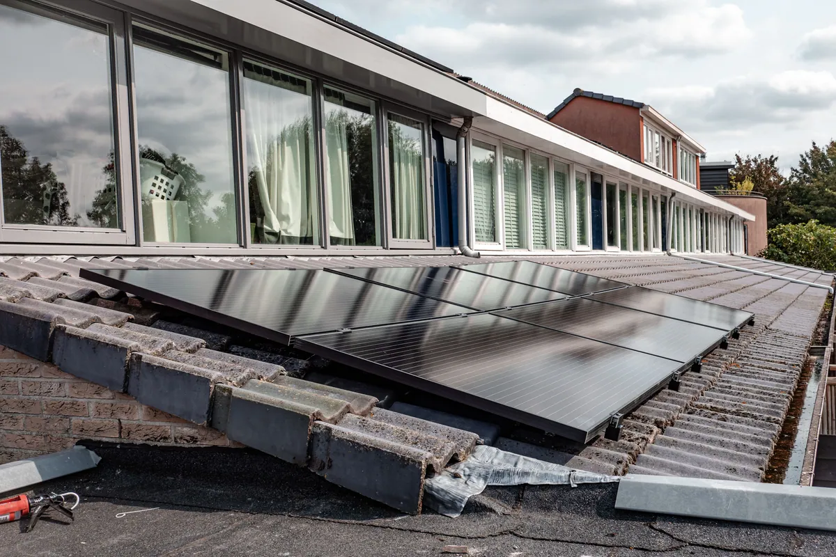 Solar panels on residential roof in sunshine